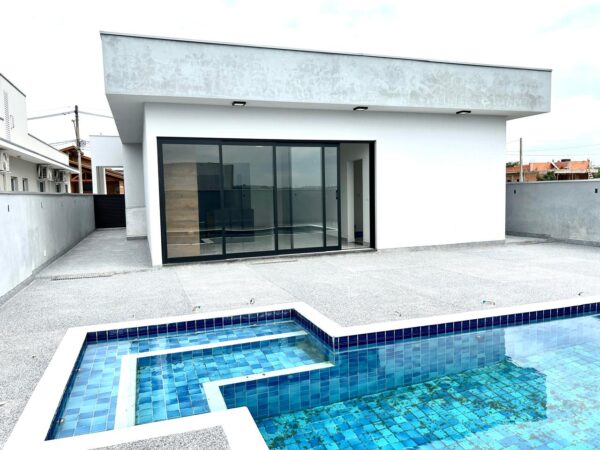 Encantadora residência com 155 m² de área construída em um terreno amplo de 420 m² - Imagem 19