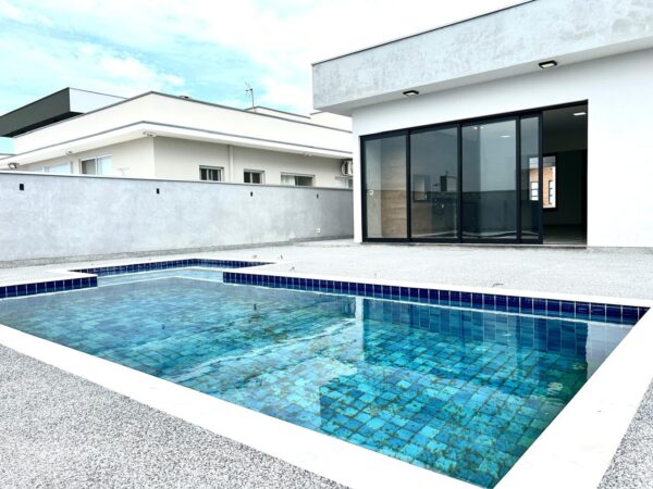 Encantadora residência com 155 m² de área construída em um terreno amplo de 420 m² - Imagem 18