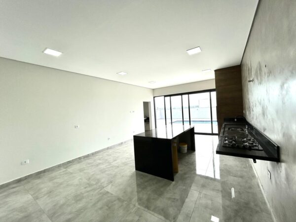 Encantadora residência com 155 m² de área construída em um terreno amplo de 420 m² - Imagem 12
