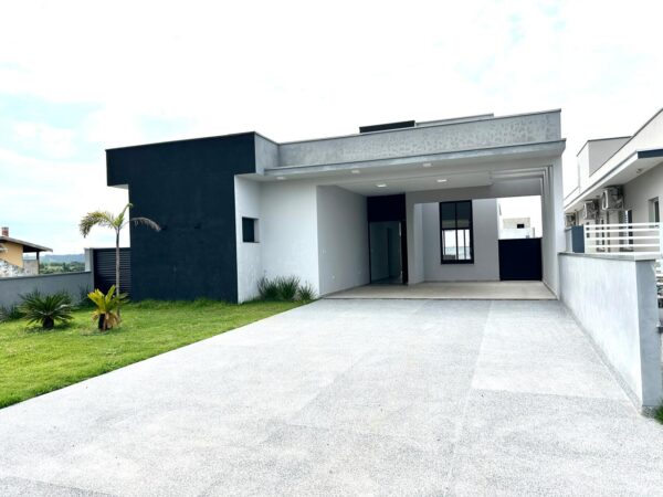 Encantadora residência com 155 m² de área construída em um terreno amplo de 420 m² - Imagem 3