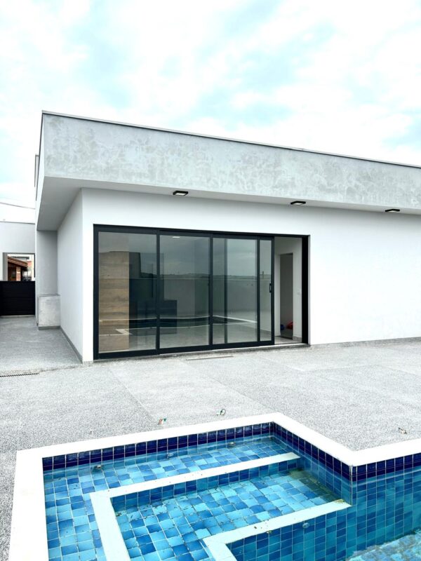Encantadora residência com 155 m² de área construída em um terreno amplo de 420 m² - Imagem 30