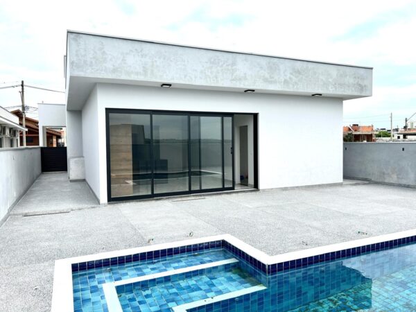 Encantadora residência com 155 m² de área construída em um terreno amplo de 420 m² - Imagem 15