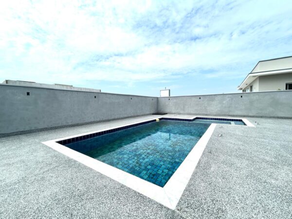 Encantadora residência com 155 m² de área construída em um terreno amplo de 420 m² - Imagem 31